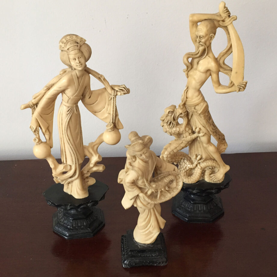 Three Asian Figures